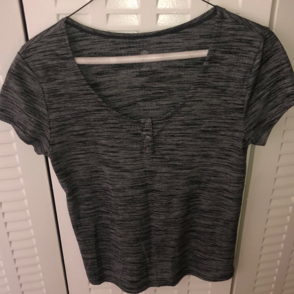 Women’s grey bottom down (half way) size L t-shirt.